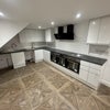 Photo 9: Shared Kitchen/Living Area