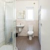 Photo 4: Two Toilets & One shower