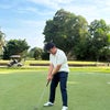 Photo 2: Enjoying a round of golf back home in Brunei.