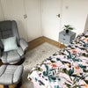 Photo 5: Comfy recliner chair & deep built-in cupboard with plenty of storage