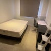 Photo 2: Double bed room fully furnished with a desk, a chest of drawers and a 3 story wardrobe.