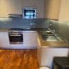 Photo 1: Kitchen fully equipped, with oven, dishwasher, microwave, fridge, freezer.