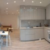 Photo 5: modern fully fitted kitchen with washer drier and large fridge