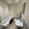 Photo 8: Shared Bathroom