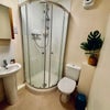 Photo 5: Bathroom shares with only 1 other. 