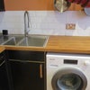 Photo 8: Kitchen sink and washing machine