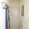 Photo 3: Front door into hallway