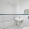 Photo 6: Shared “extra” bathroom with bath tub 