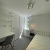 Photo 4: Bedroom 6 of similar size and layout