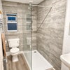 Photo 5: Modern shared bathroom with large walk-in shower