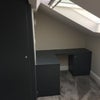 Photo 2: Desk and storage area