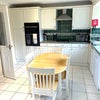 Photo 7: The kitchen 