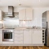 Photo 5: Open plan kitchen