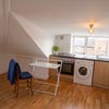 Photo 2: living area and kitchen