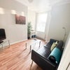 Photo 2: Separate lounge area with SMART TV