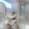 Photo 5:  Shared bathroom (cleaned weekly by the landlords complimentary cleaner)