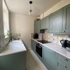 Photo 4: Is that real marble countertop??? No don't be daft