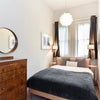 Photo 5: The room that's available, with built in storage round to the left