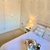 Photo 5: Wardrobes in bedroom