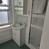 Photo 9: Shared bathroom with a bathtub
