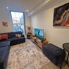 Photo 3: Spacious lounge with 50” Smart TV and Netflix