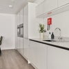 Photo 5: Modern, fully equipped kitchen with dishwasher and washer/dryer