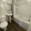 Photo 4: This bathroom has been refurbished and is now a large shower instead of bath