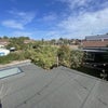 Photo 5: Shared rooftop with view over garden, nearby basketball court, and trees