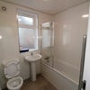 Photo 7: FIRST BATHROOM