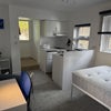Photo 3: Bedroom with kitchen & ensuite toilet