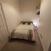 Photo 5: Second, smaller bedroom