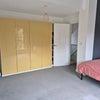 Photo 2: Spacious double bedroom 1 fitted with wardrobes