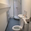 Photo 9: First floor shower and toilet