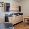 Photo 2: Flat F looking towards the kitchen units