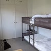 Photo 9: Bunks have been swapped for king size bed