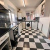 Photo 2: Fully equipped kitchen, both washer and dryer