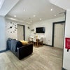 Photo 13: Communal space that is comfy and welcoming