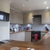 Photo 17: Communal kitchen is fully equipped with everything you need.