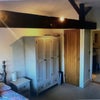 Photo 4: wardrobe,cooking cupboard and open en-suite door 