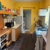 Photo 6: Kitchen & pantry area - little loo right at the end 