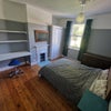 Photo 2: Smaller back bedroom 