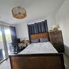 Photo 4: King Sized Bed with daylight
