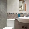 Photo 4: Ensuite, basin with vanity, large mirror, towel rail, humidity extractor, underfloor heating