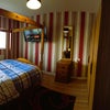 Photo 2: Room 1 - Double, with 43 inch Smart TV and 4-poster bed