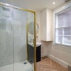 Photo 11: shared bathroom