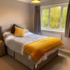Photo 7: Room 1-Showing Double Bed, Bedside cabinet and Bedside Light