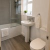 Photo 2: shared bathroom (bath and shower)