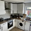Photo 5: Clean and modern kitchen