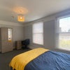 Photo 2: Double bedroom with wardrobe and desk