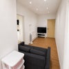 Photo 2: Living area / Sofa / TV